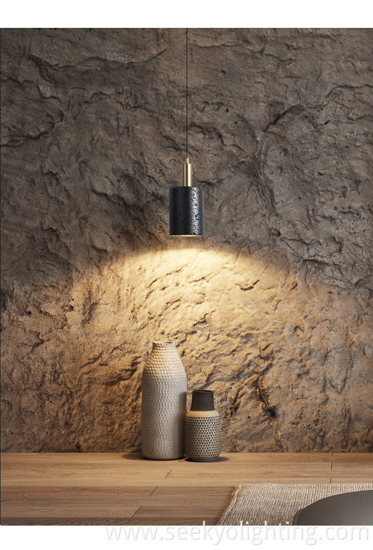 The pendant lamp is suspended by a sleek metal rod or chain, adding to its modern aesthetic. The pendant lamp is suspended by a sleek metal rod or chain, adding to its modern aesthetic.